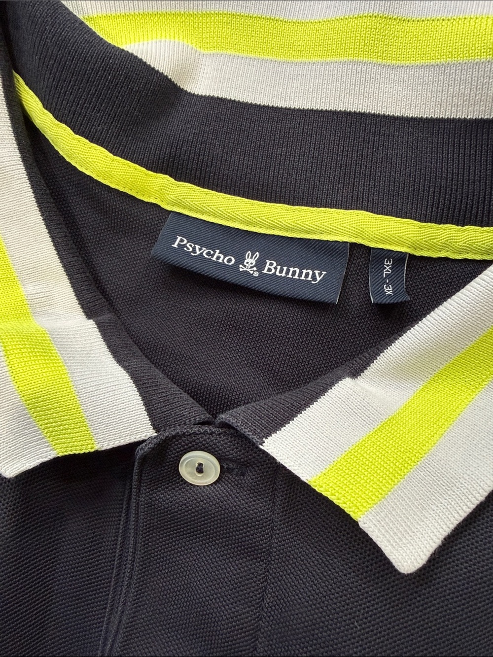 Psycho Bunny Black Polo with Neon Yellow & White Stripe Collar